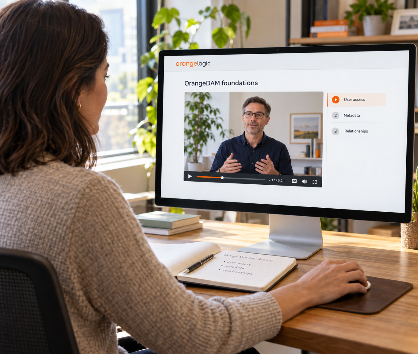 Woman viewing OrangeDAM foundations training